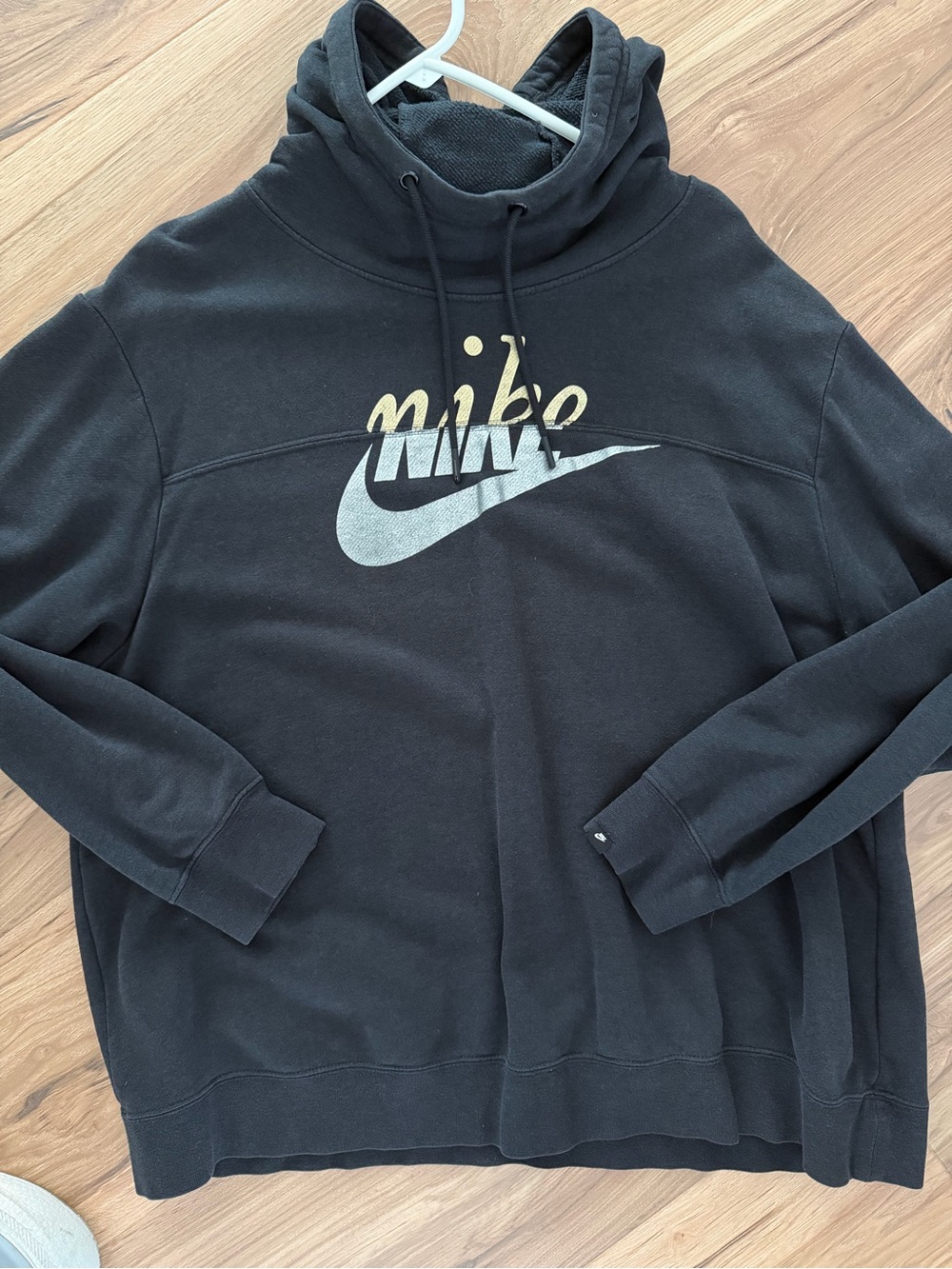 Nike Black Hoodie with Metallic Gold Script and Silver Swoosh